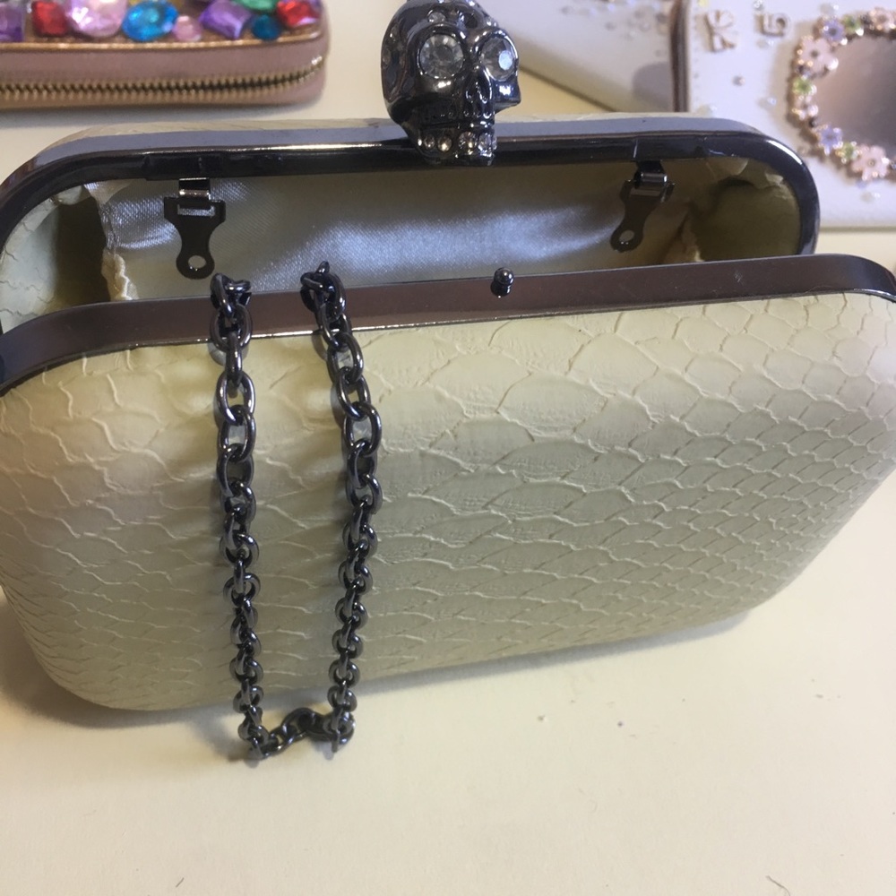 Canary Clutch. With metal strap